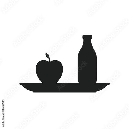 Silhouetted apple and milk bottle on a tray  