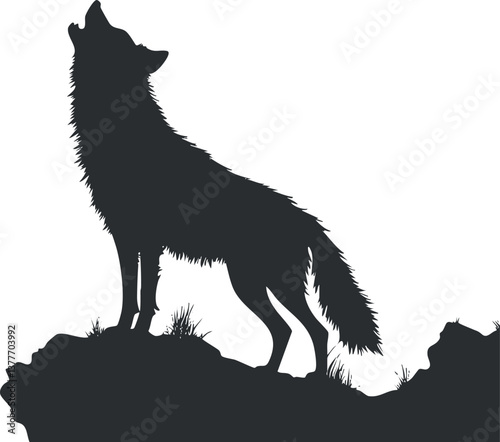 Silhouette of a howling wolf on a mountain, highlighting its wild and nocturnal nature.
