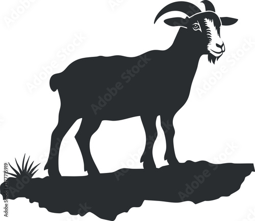 Silhouette of a goat with horns standing on a rocky terrain in a natural setting.