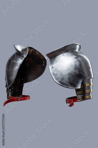 Medieval Steel Shoulder Armor with Gorget. Set of polished spaulders providing protection for the shoulders and upper chest. photo