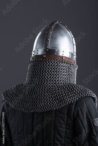 Simple Medieval Knight's Nasal Helmet with Chainmail. Classic head protection featuring a central nose guard and attached chainmail collar.