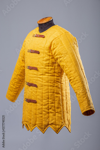 Yellow Padded Gambeson Jacket. Medieval quilted under-armor with leather strap closures.