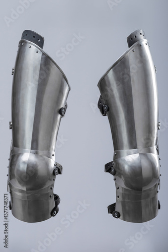 Steel Plate Leg Armor for Medieval Knight. Full leg protection with articulated segments from knee to ankle.