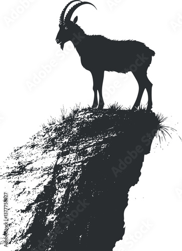 Silhouette of a goat standing on a steep cliff against a clear sky background.