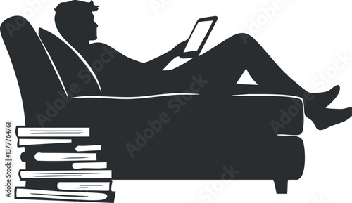 Silhouette of a man relaxing on a couch with a tablet, next to a stack of books.
