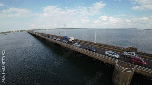 Wallpaper Mural Aerial drone view of binational railway bridge with vehicles and trucks over Parana River Torontodigital.ca