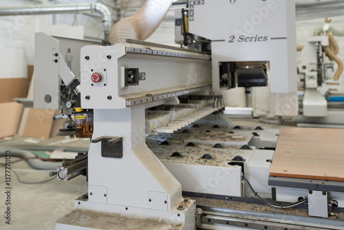 CNC Cutting machine in industry factory. CNC automatic woodworking machine in manufacturing industry
