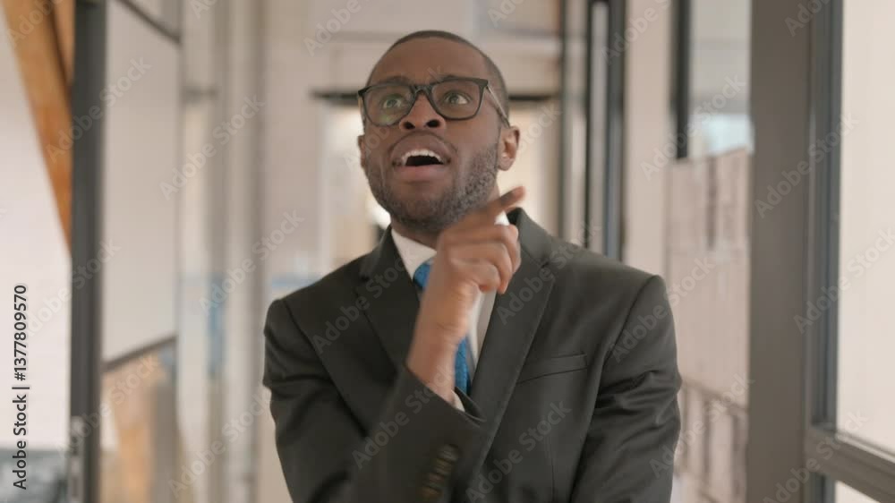 Portrait of Brainstorming African Businessman with New Idea