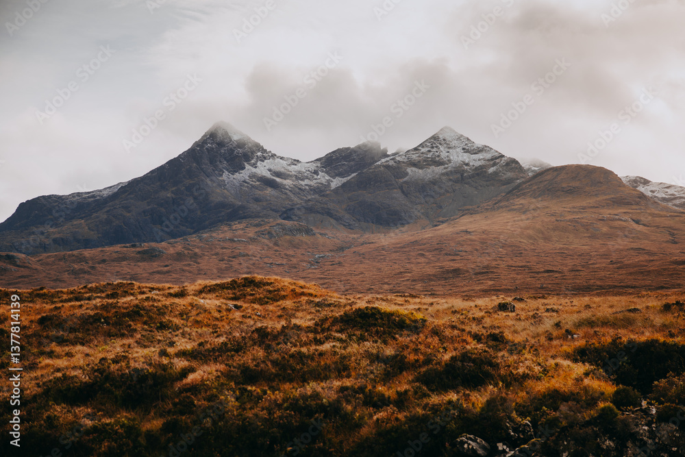 The Isle of Skye’s autumn landscapes blend golden moors, misty peaks, and rugged coastlines. A land of dramatic beauty, where nature’s wild spirit thrives.