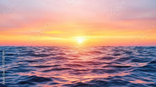 Sunset over the ocean scenic view with vibrant sky and dramatic dusk concept. Vibrant sunset over calm ocean waves, creating a serene atmosphere.
