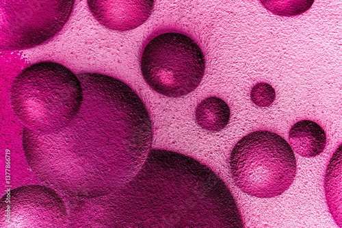 urban street wall aerosol graffiti painting with drawing of colorful round bubbles and balls in space