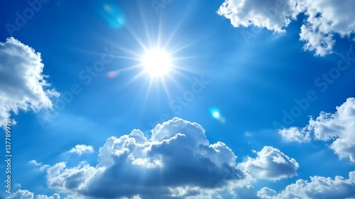 Low angle timelapse bright sun on blue summer sky with moving fluffy clouds, sun shining sunbeams, white cumulus clouds on sunshine day. Time-lapse, sun rays daylight, sunny cloudscape