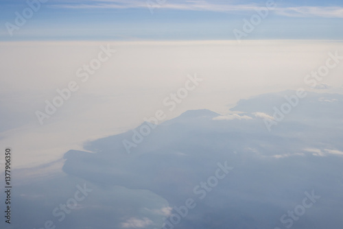 Obraz na płótnie Aerial view of the sea coast. Coast of the Sea of Okhotsk, Magadan region, Far East of Russia. Soft focus. Blurred natural background. w salonie