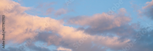 Obraz na płótnie Beautiful sunset sky background with clouds. Scenic cloudscape. Wide panoramic background for design. w salonie