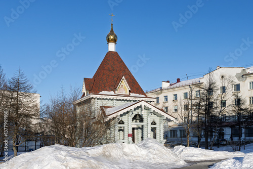 Church of Saint Tatiana, Magadan city, Magadan region, Russia. Winter view of a small wooden Orthodox church. Christianity in Siberia and the Russian Far East.