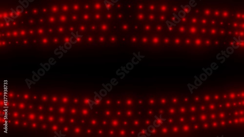 A black background is depicted in this video, with a red-colored light visible at the top. The video features a few red dots.