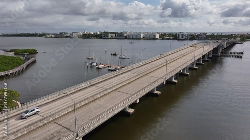 Wallpaper Mural static drone shot looking northeast from Bryant Park inLake Worth Beach Florida over the drawbridge and the ICW, intracoastal waterway with the Atlantic Ocean far in the distance Torontodigital.ca