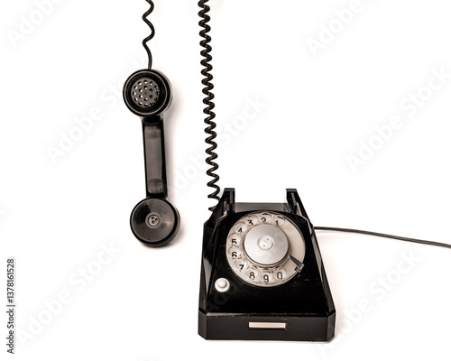 Vintage dial telephone. Isolated olive green telephone on gray background. Old fashioned technology. 