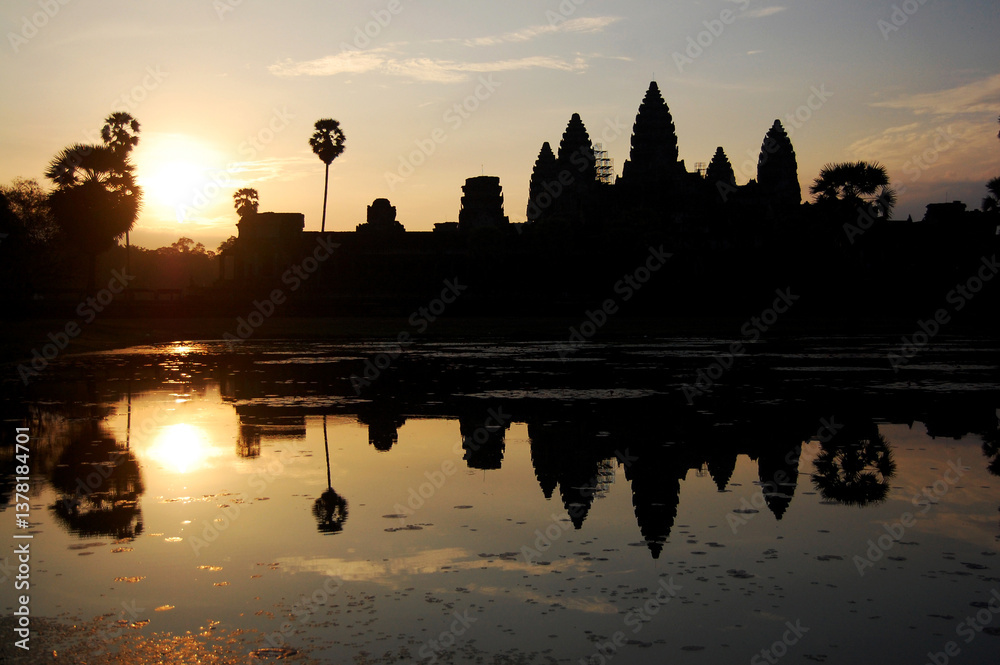 Obraz premium Ancient ruins antique building castle Khmer Empire of Angkor Wat city temple for cambodian people foreign travelers travel visit respect praying and looking landscape sunrise in Siem Reap, Cambodia