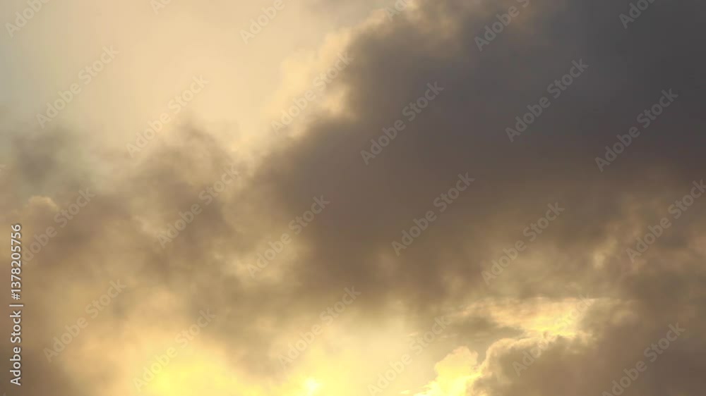 Time lapse of dark clouds passing by, at sunset Time lapse of dark clouds passing by, at sunset