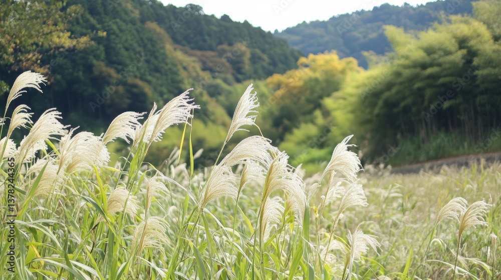 Obraz premium A panoramic view showcasing the gentle sway of tall reeds under a cerulean sky, evoking feelings of peace and natural splendor.