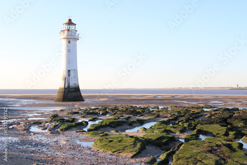 Lighthouse on a sandy beach