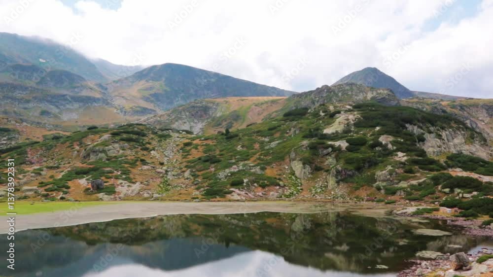 Lake up in the mountains on a cloudy day Lake up in the mountains on a cloudy day