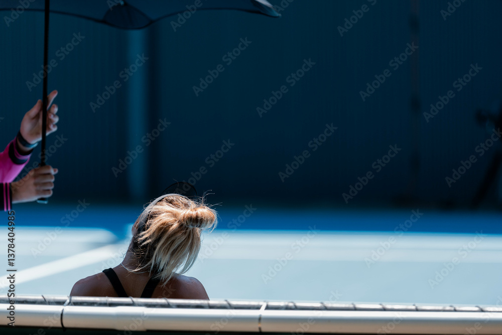 blue hard court tennis court at a tennis court in summer in australia outdoors