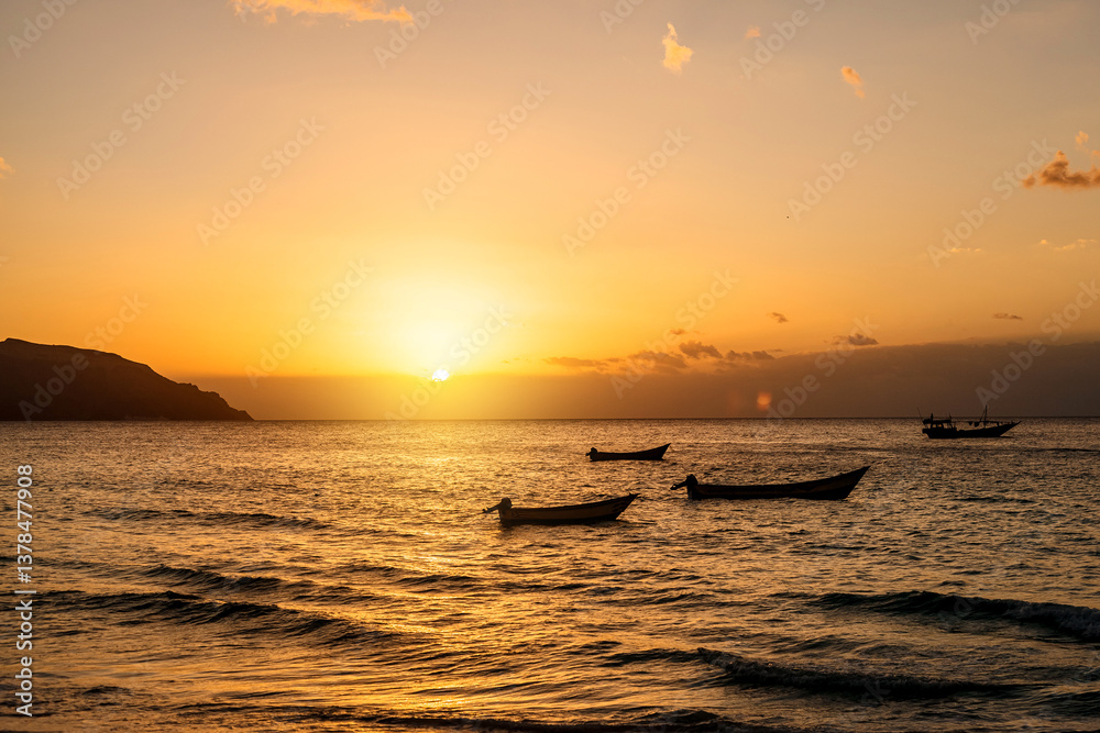 Sunset at Socotra. Landscape with fishing boats Sunset at Socotra. Landscape with fishing boats