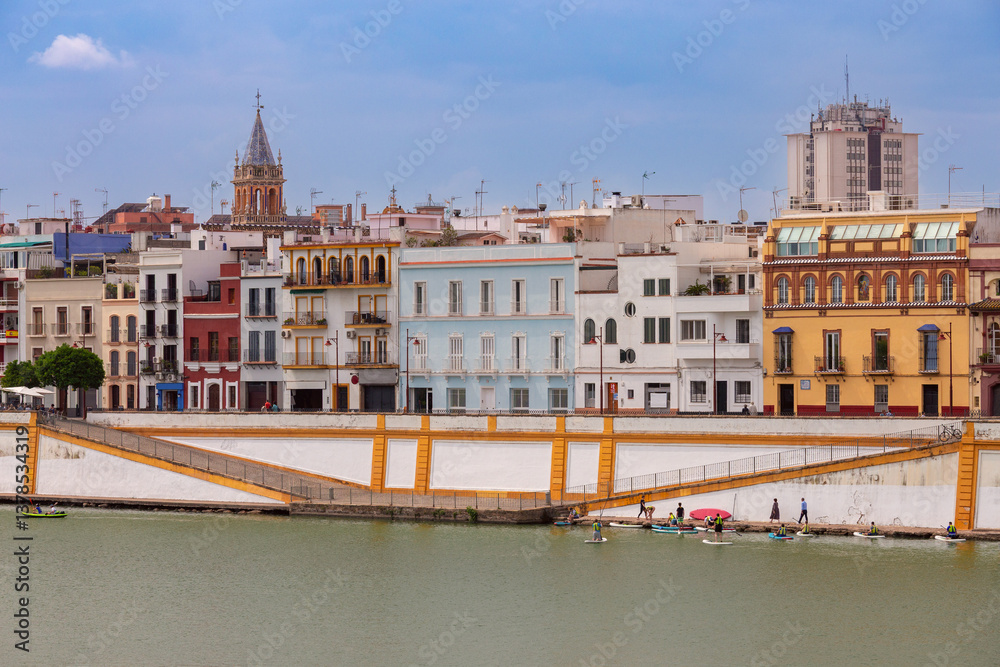 Naklejka premium Colorful riverside houses in Seville Spain