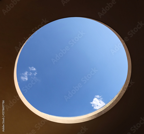 Wallpaper Mural large open circular opening in a building with blue sky and clouds visible (modern architecture skylight) mexico window to outdoors Torontodigital.ca