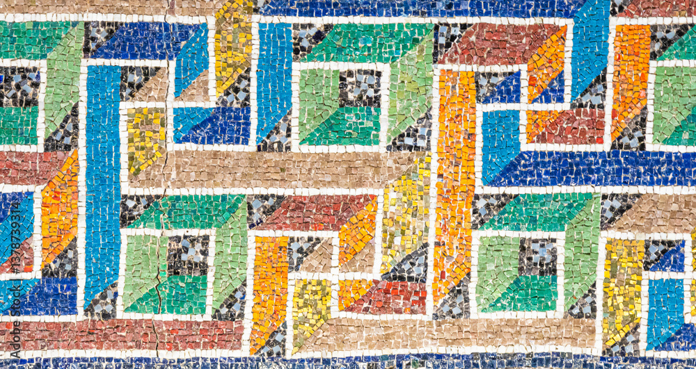 Marble mosaic decoration. Detail and colors in this photography, no people, geometric pattern.