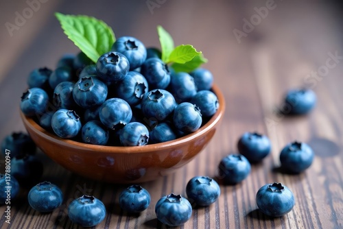 Wallpaper Mural Bowl of vibrant blueberries, scattered around , diet, organic Torontodigital.ca