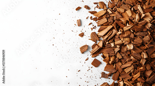 Whole sandalwood shavings in different sizes scattered