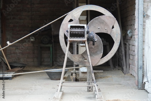 A chaff cutter, a machine used in agriculture to chop straw or hay into small pieces for animal feed