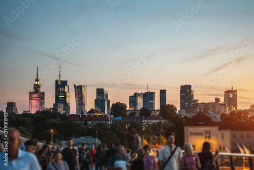 Принти на полотні sunset over skyline of Warsaw city with skyscrapers and downtown district, crowd