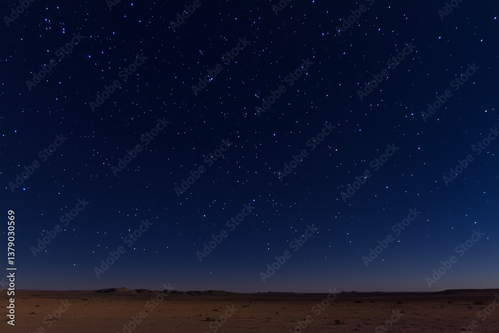 Fototapeta premium A clear, star-filled night sky over an empty desert