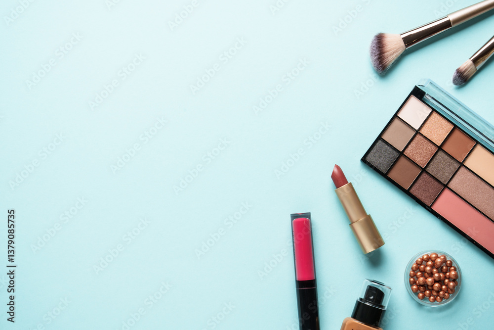 Beauty products on blue background.