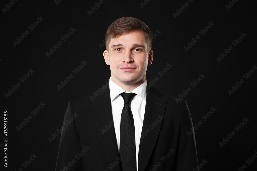 Man in classic suit on black background Man in classic suit on black background