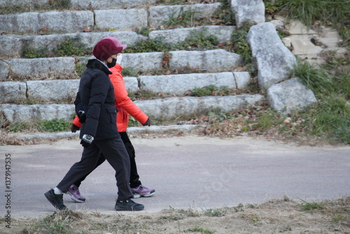 Image of people jogging and walking on the Daecheongcheon trail
