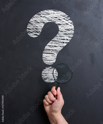 Obraz na plátne White question mark drawn with chalk on a black chalkboard