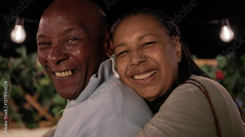 Happy Latin senior couple enjoy moment together outside home terrace , Older people love concept