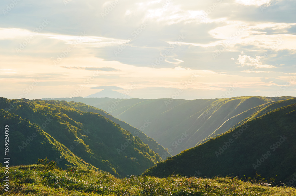 Obraz premium Rolling Green Hills with Mombacho Volcano in the Background