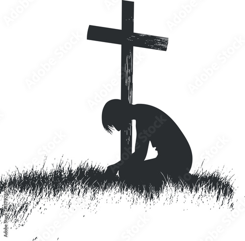 Silhouette of a person kneeling in prayer before a cross in a grassy area.