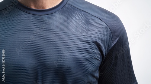 Close-up of dark textured athletic shirt with mesh pattern for breathability