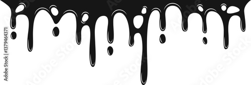 Dark blackened oil forming an irregular pool with dripping edges.