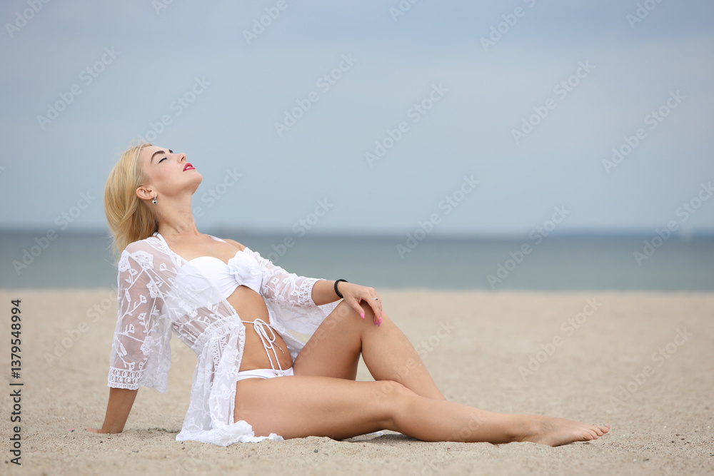 Elegant Woman in White Bikini and Lace Cover-Up Elegant Woman in White Bikini and Lace Cover-Up