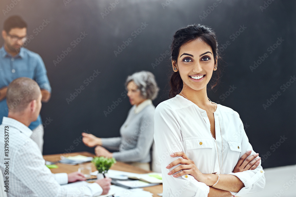 Arms crossed, portrait and smile of business woman in boardroom of office for leadership. About us, coworking and friendly with happy employee team in creative workplace for project management Arms crossed, portrait and smile of business woman in boardroom of office for leadership. About us, coworking and friendly with happy employee team in creative workplace for project management