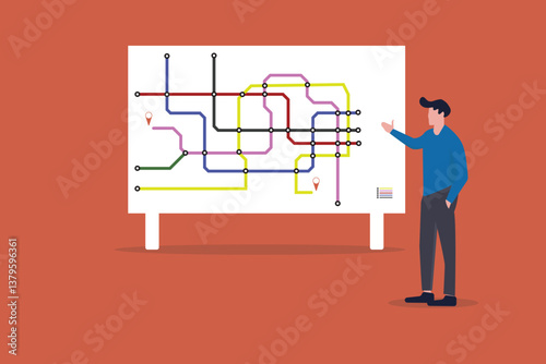 Mature businessman looking at map in subway station