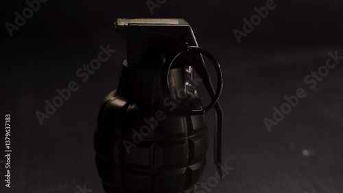 Wallpaper Mural Grenade and smoke surrounding the grenade - low key light setting = bcacklight Torontodigital.ca